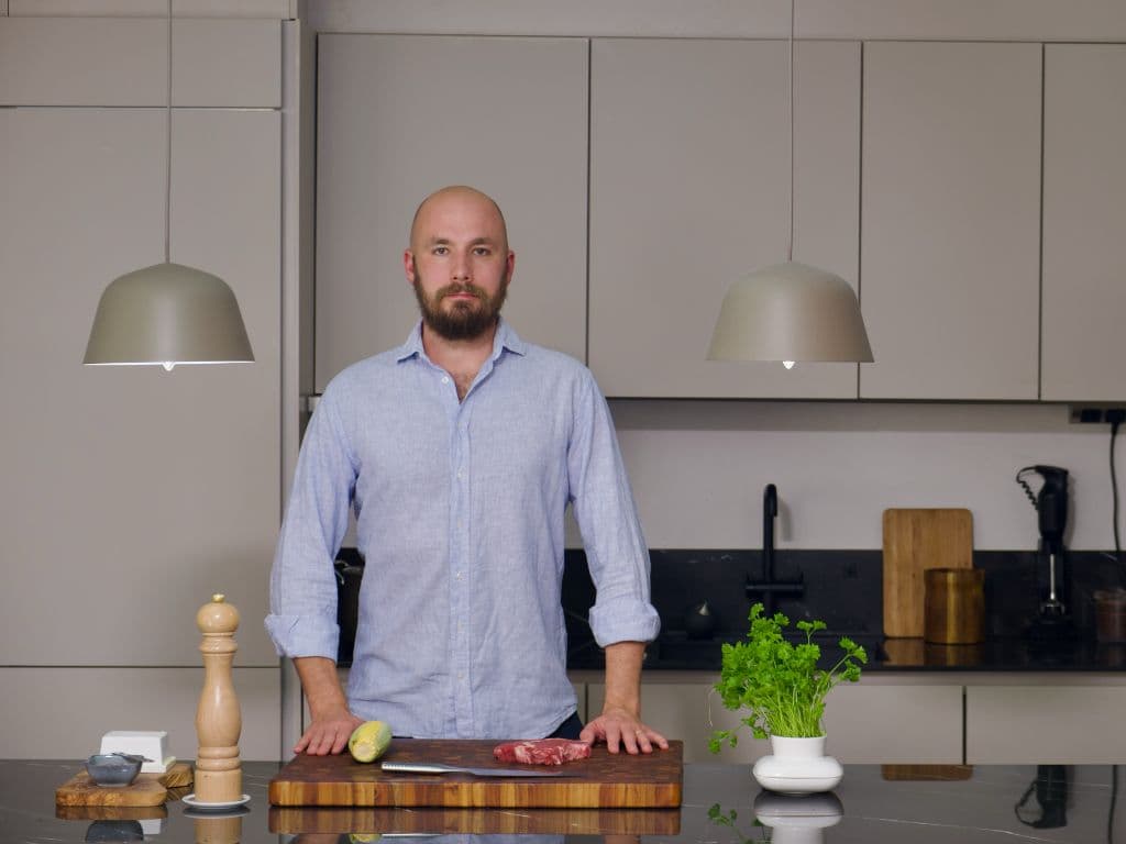 Nico learning cooking from scratch in his home kitchen, developing fundamental cooking skills